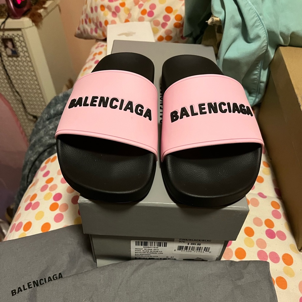 Balenciaga pool slides.